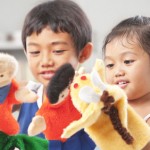 Children Playing with Puppets
