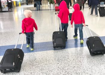 Three Children at Airport