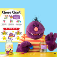 Milo with his Chore Chart and Buttons