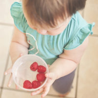Child with Bowl of Berries