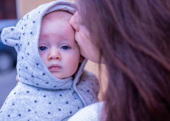 Woman Kissing Baby